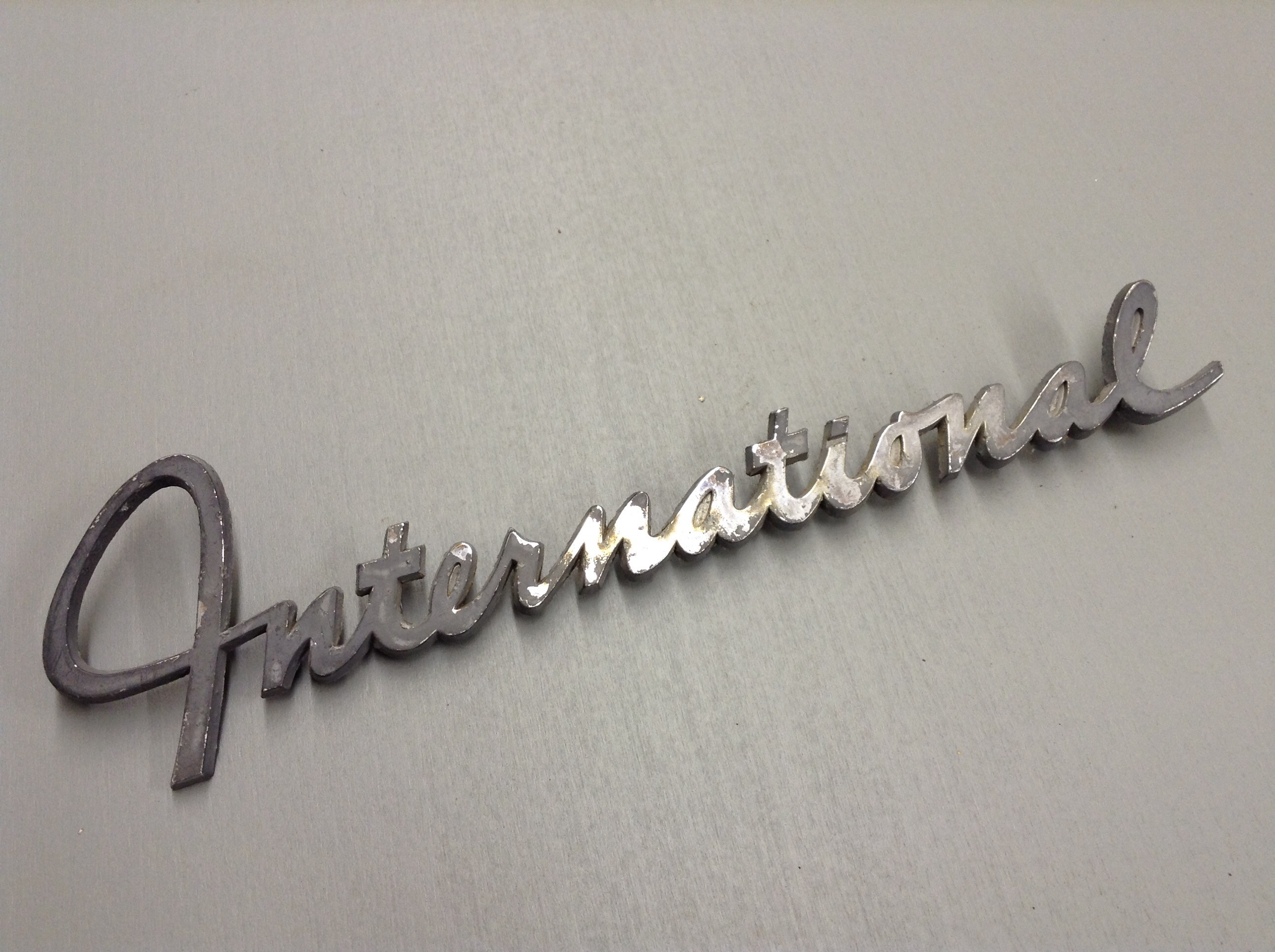 International emblem script 60's truck Travelall 10